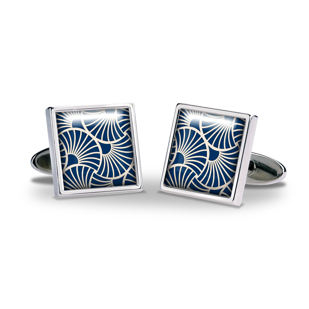Pair of square cufflinks with blue and white pattern on a white background