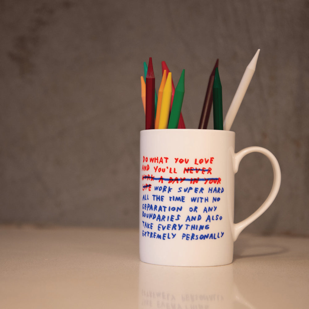 Color pencils in mug.