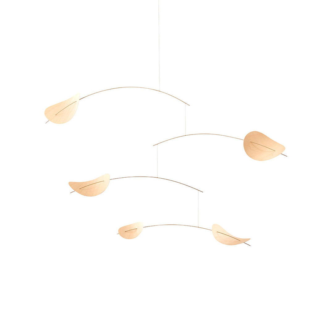 A minimalist mobile with five light beige leaf-shaped elements suspended on thin curved metal wires against a solid white background.