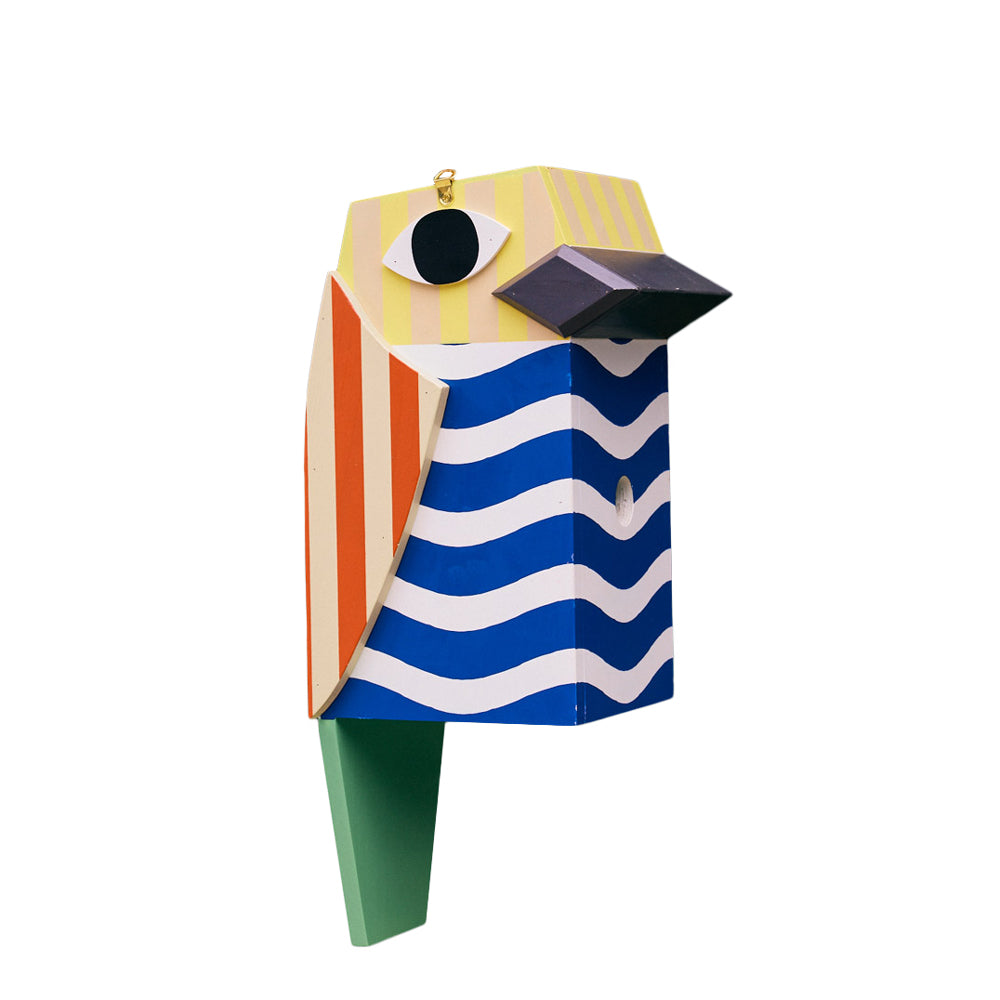 Colorful bird-shaped birdhosue with striped pattern on a white background