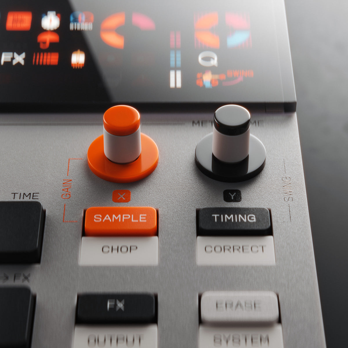 Close-up of a digital audio workstation with control knobs and buttons.
