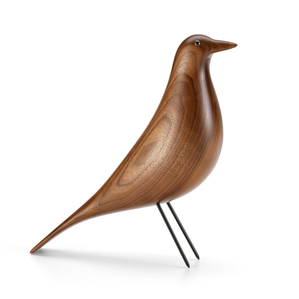 Wooden bird sculpture on a white background