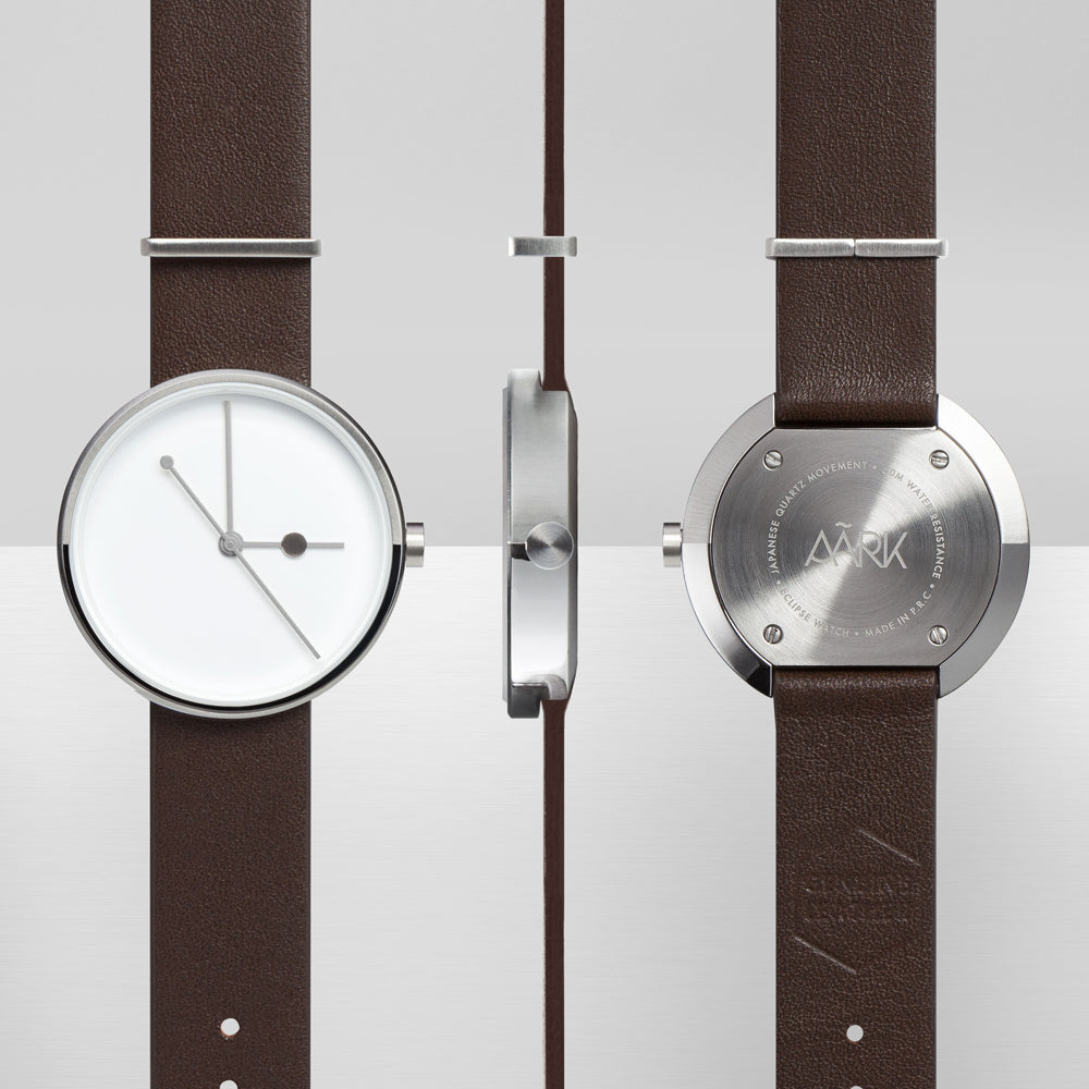 Front, side and back view of watch.
