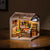 Image of the DIY Miniature Dollhouse Kit: Fascinating Book Store, assembled.