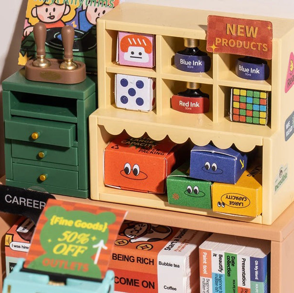 Close up of miniature book store furniture.