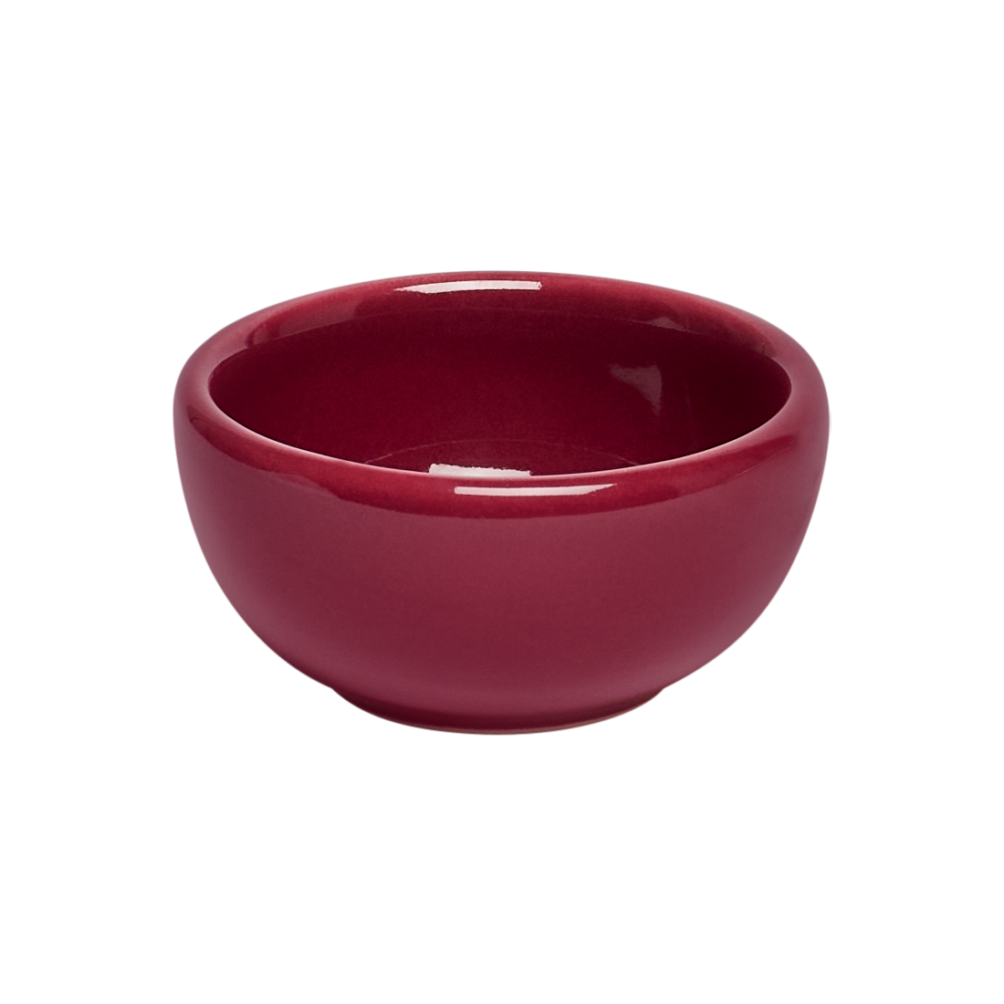 Red ceramic bowl on a white background
