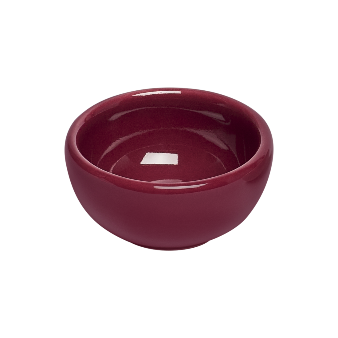 Red ceramic bowl on a white background