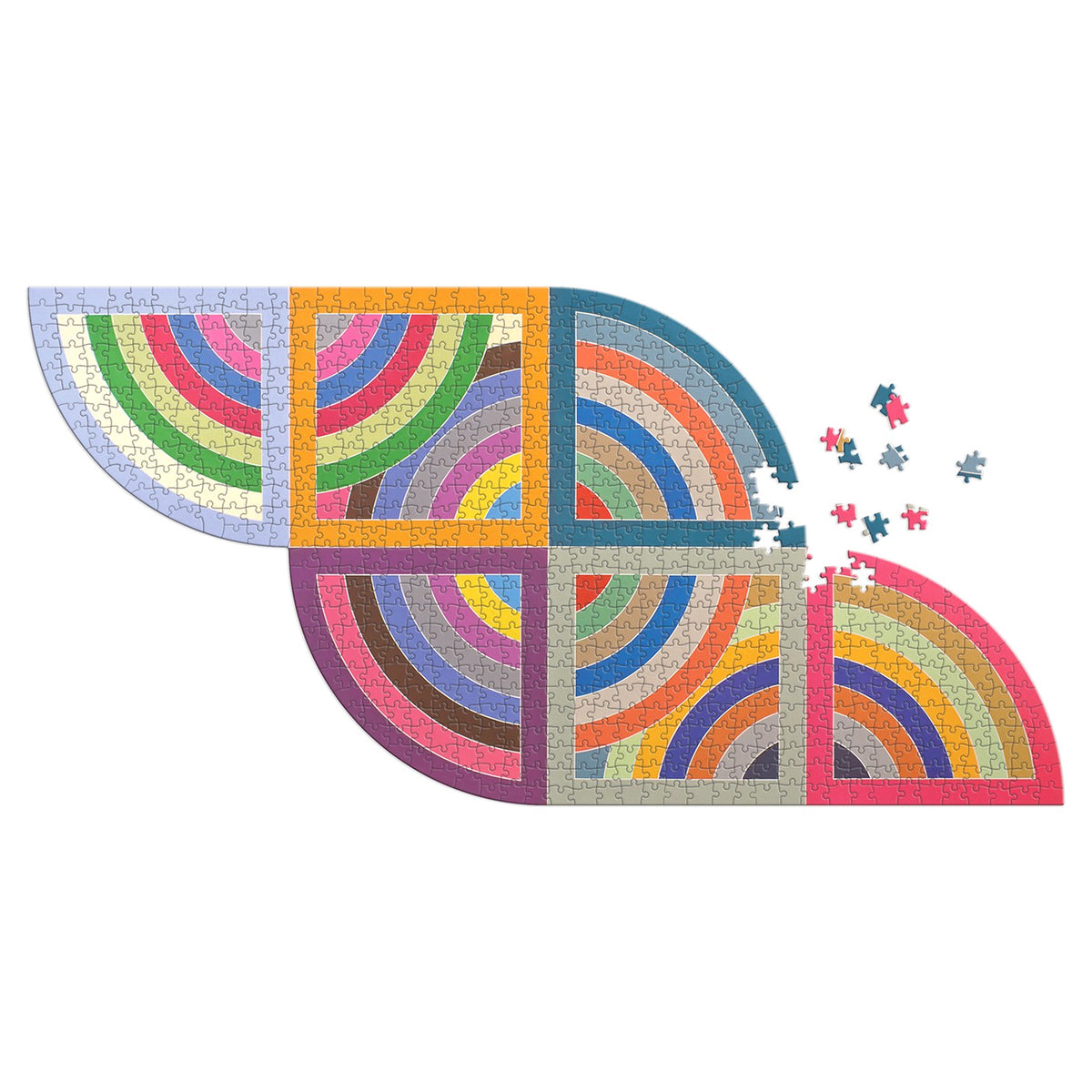 Boxed puzzle product titled 'Frank Stella' with colorful geometric artwork on the lid and a row of multicolored puzzle pieces visible in a green tray along the bottom. Text reads '750 Piece Shaped Puzzle' and 'Harran II, 1967'.