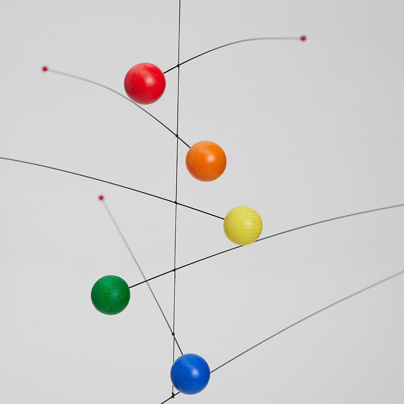 Color spheres with primary and secondary colors mobile on a white background