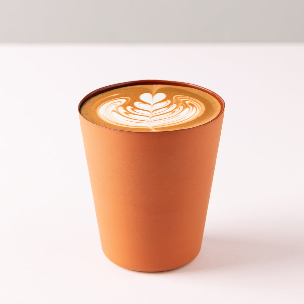 Gaeastar Reusable Clay Cup with cappuccino.