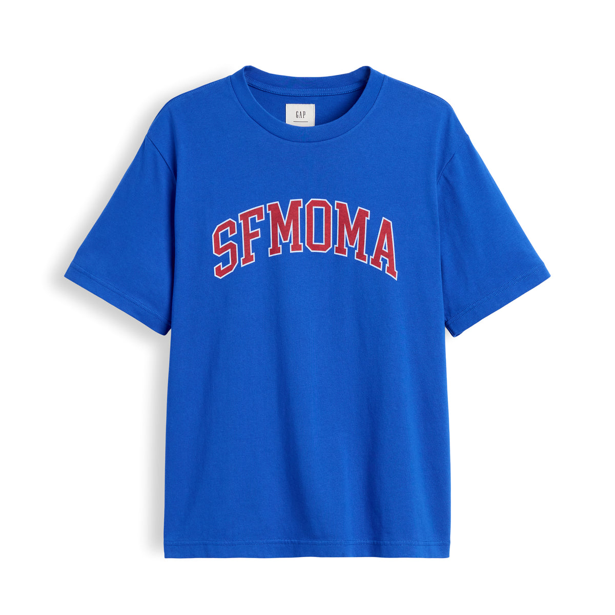 A royal blue short-sleeve t-shirt with 'SFMOMA' printed in red arched block letters with a white outline across the chest, displayed on a clean white background.