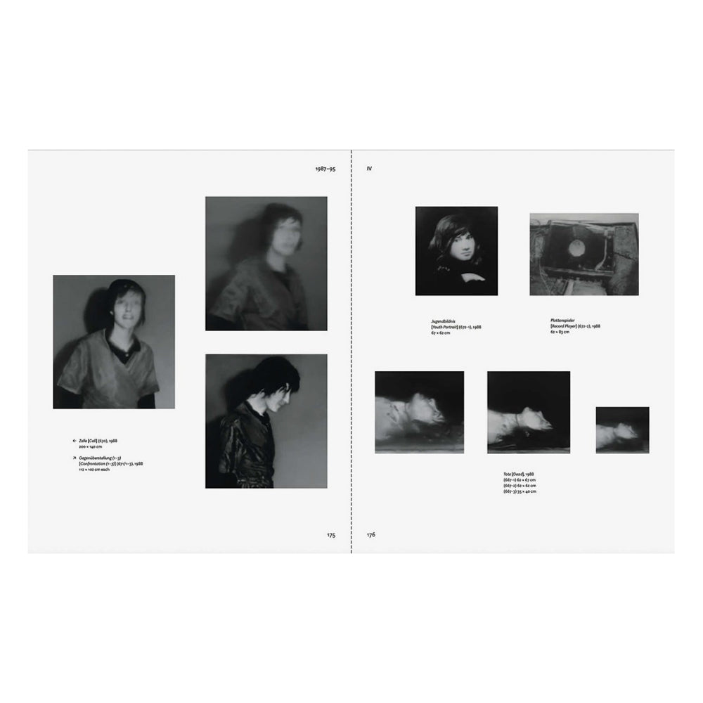 Black and white photo album pages with portraits.