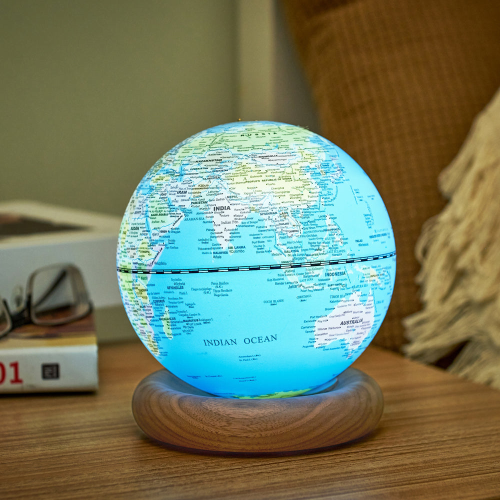 Globe on nightstand. 