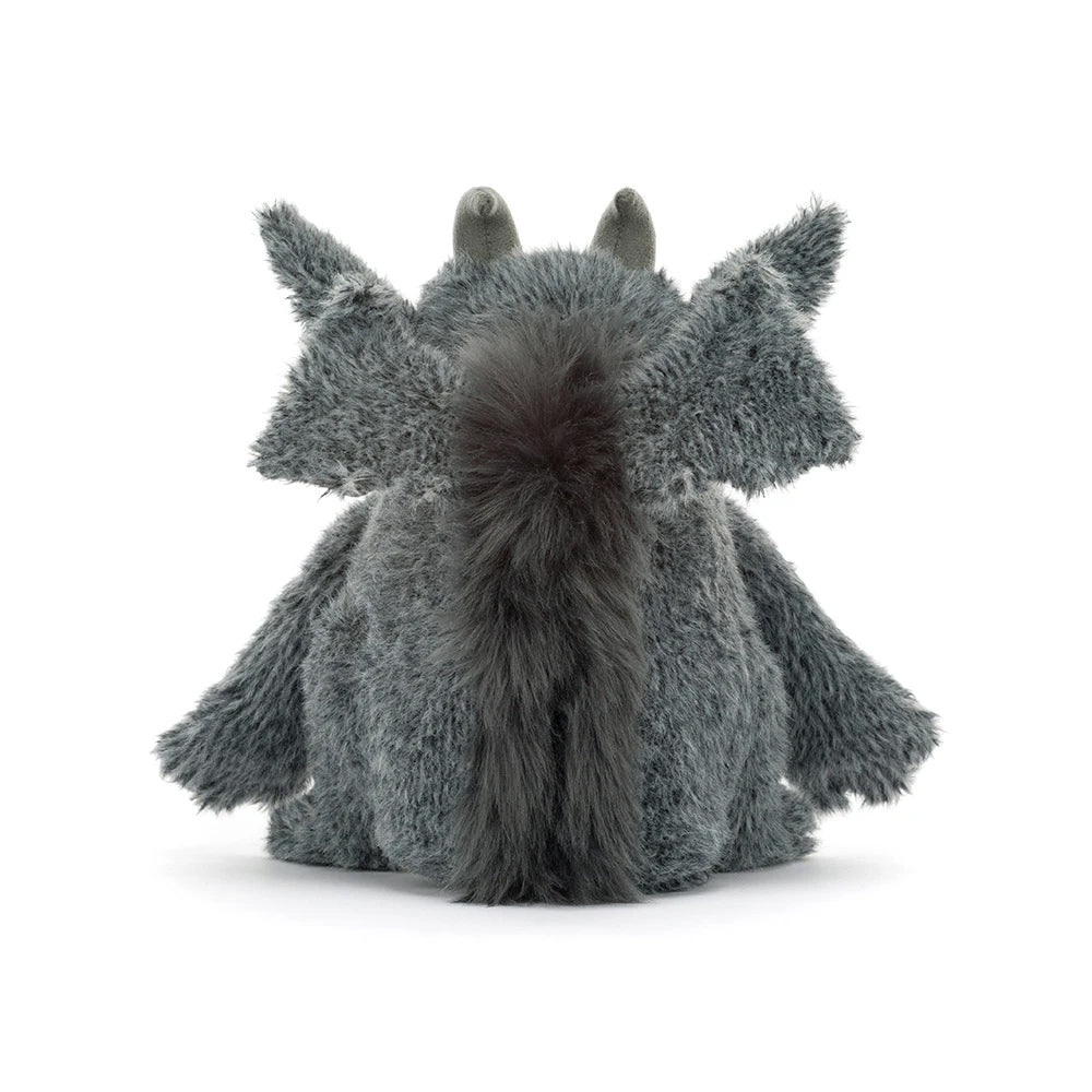 A gray plush toy shown from the back, featuring fluffy textured fur, small horns, and wings, photographed on a clean white background.