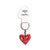 Haring Red Heart Face Keychain with label.