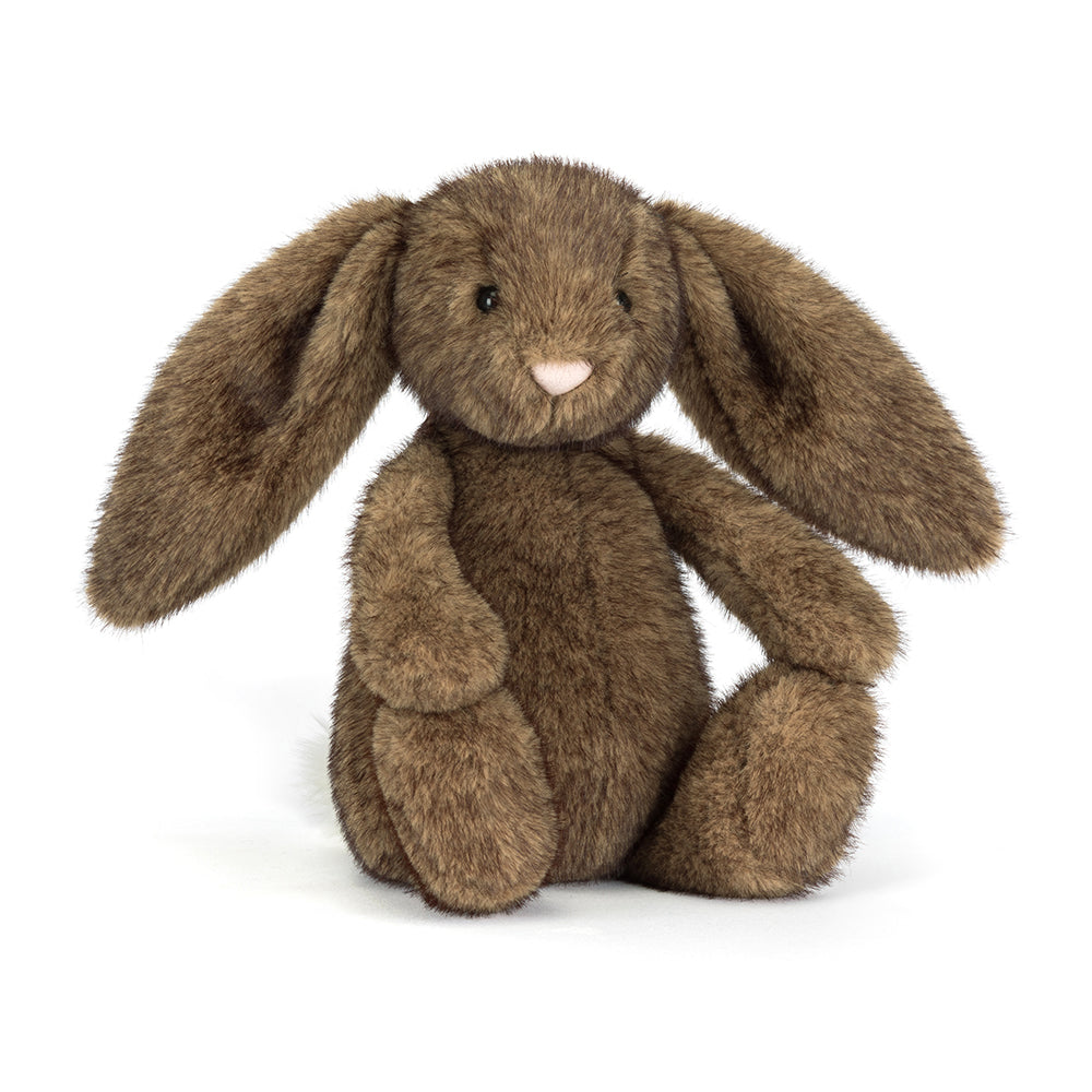 Brown plush bunny toy on a white background