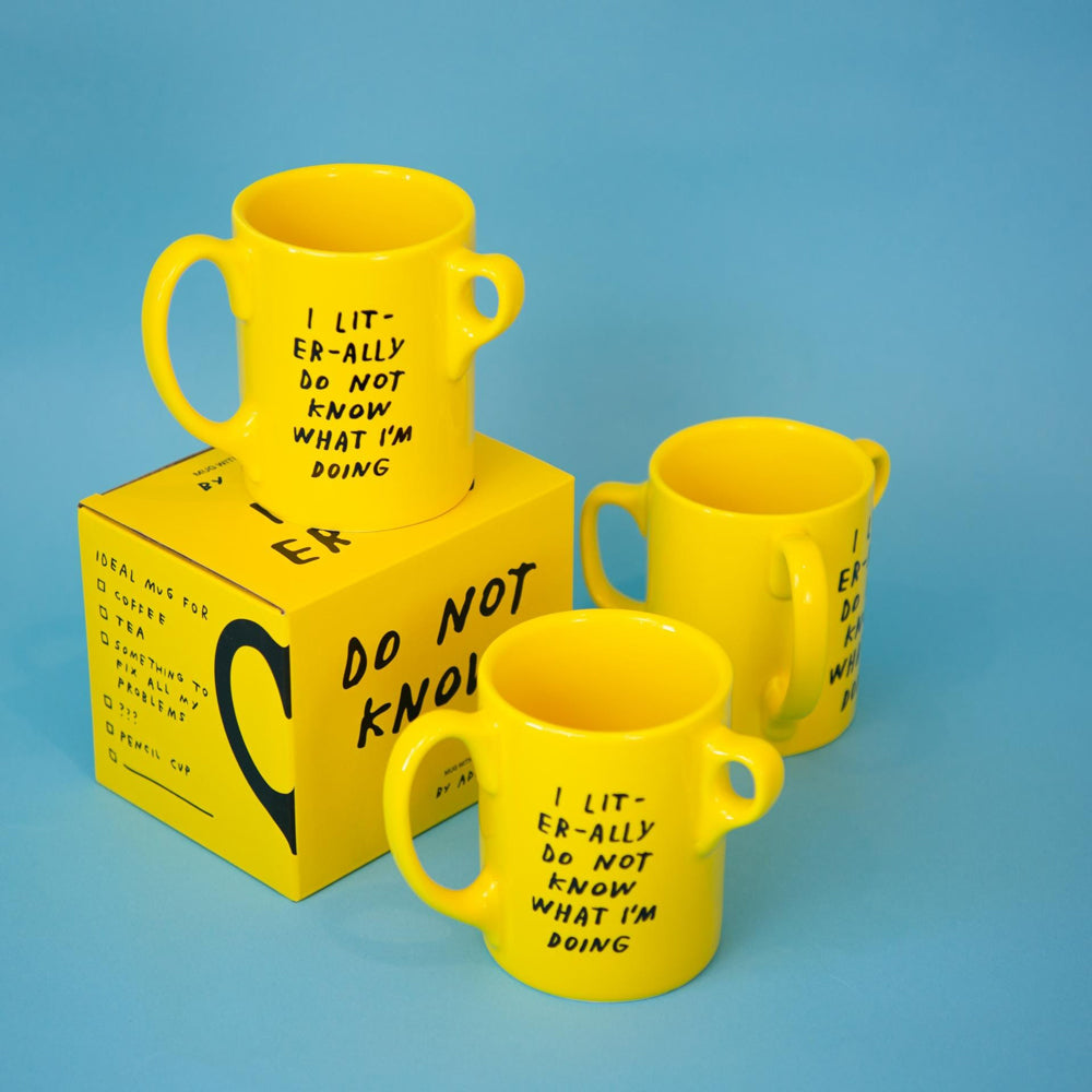 Three mugs with packaging.