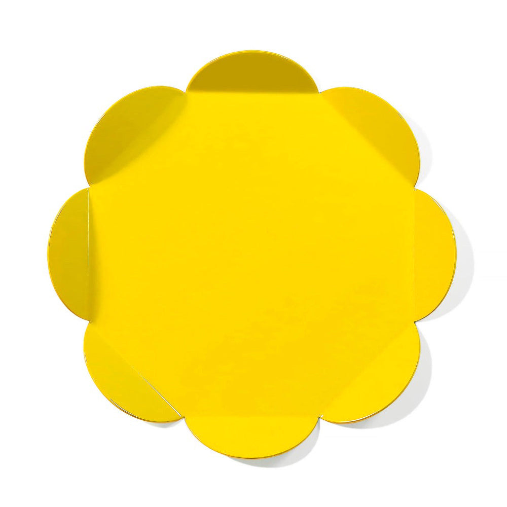 Yellow flower-shaped tray on a white background