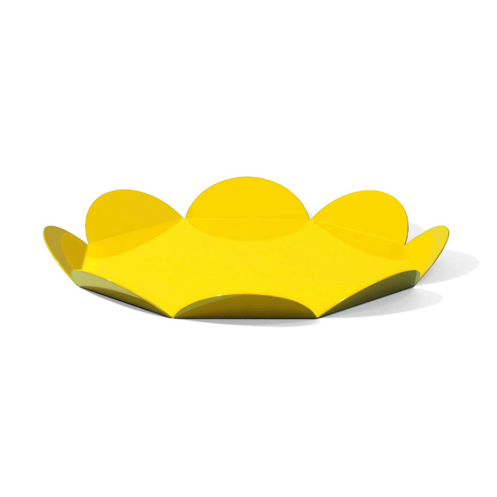 Yellow flower-shaped tray on a white background
