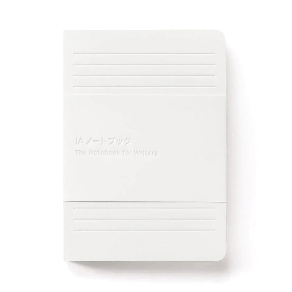 White notebook with line pattern on a white background