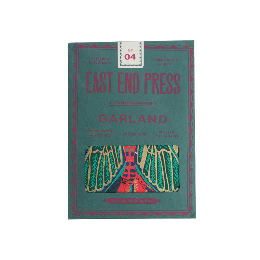 Pack of 'Garland' paper by East End Press with decorative design on a teal background