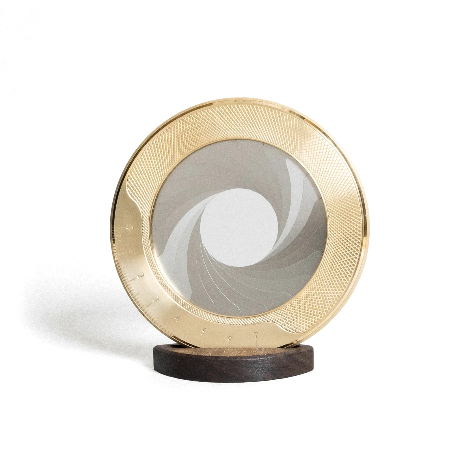 Iris drawing tool with gold circular design on a white background