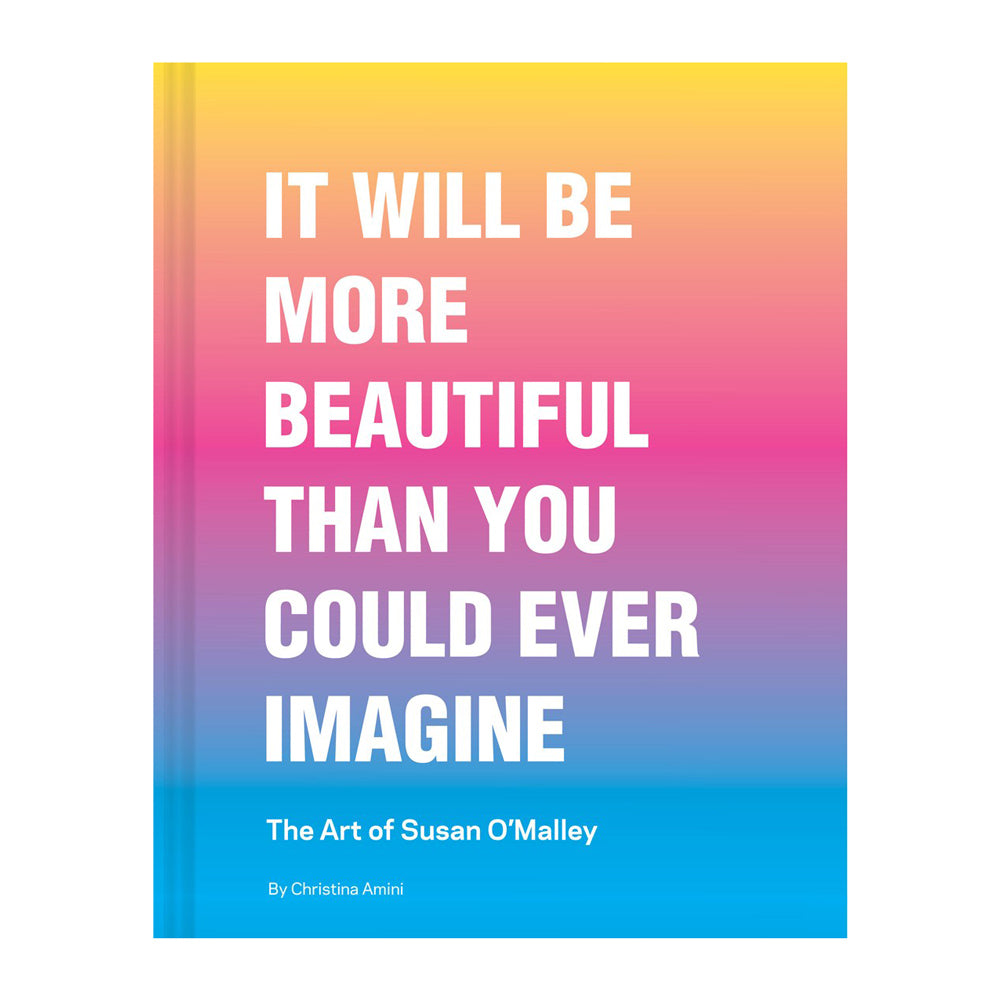 A book cover with a bright vertical gradient transitioning from yellow at the top, through orange and pink, to purple and blue at the bottom. Large white text reads “IT WILL BE MORE BEAUTIFUL THAN YOU COULD EVER IMAGINE,” with smaller text below reading “The Art of Susan O’Malley” and “By Christina Amini.