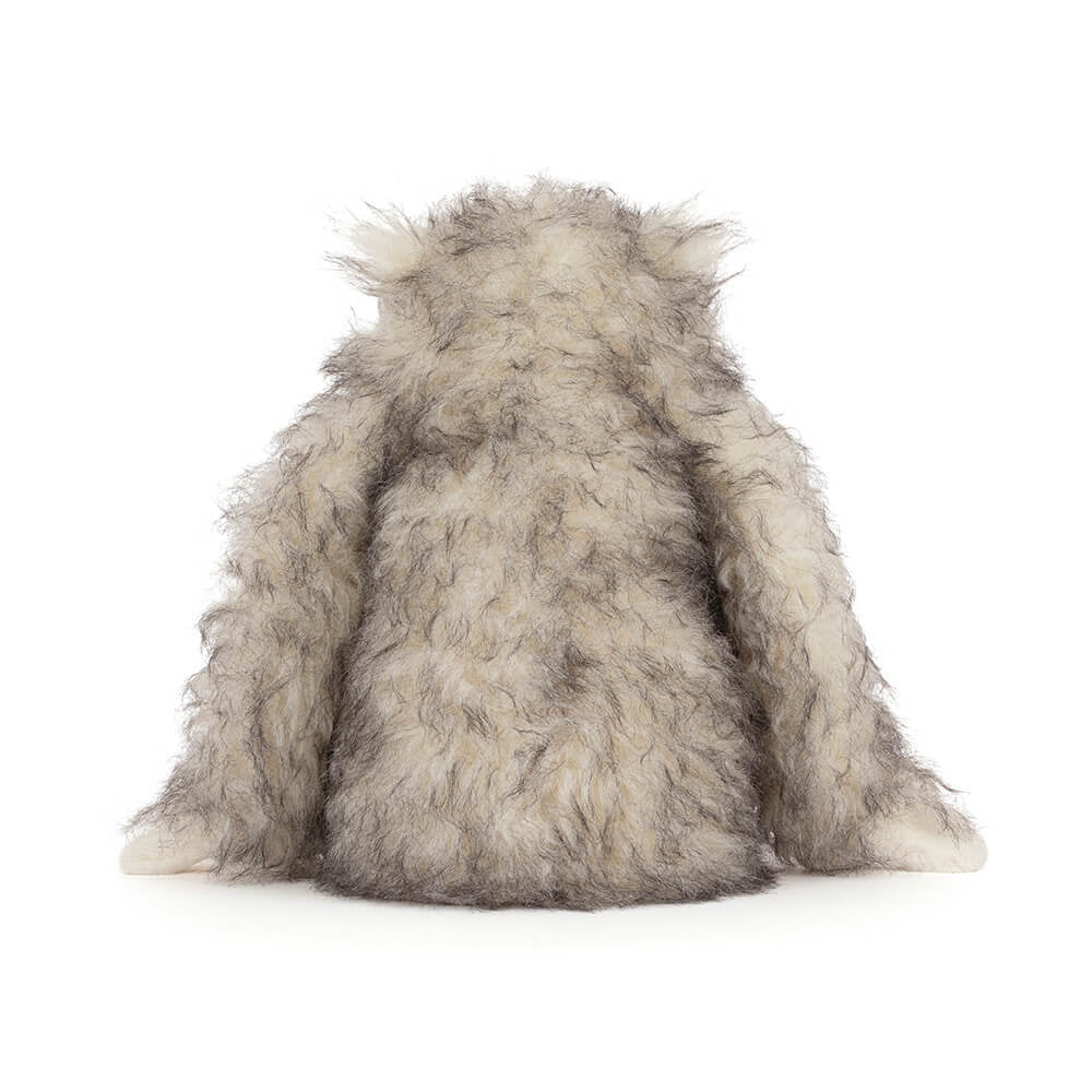 Fluffy gray toy on a white background