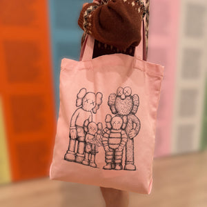 files/KAWS-family-tote-lifestyle_2048x_59130254-400d-4e9c-9d28-7327f8156c3a.jpg