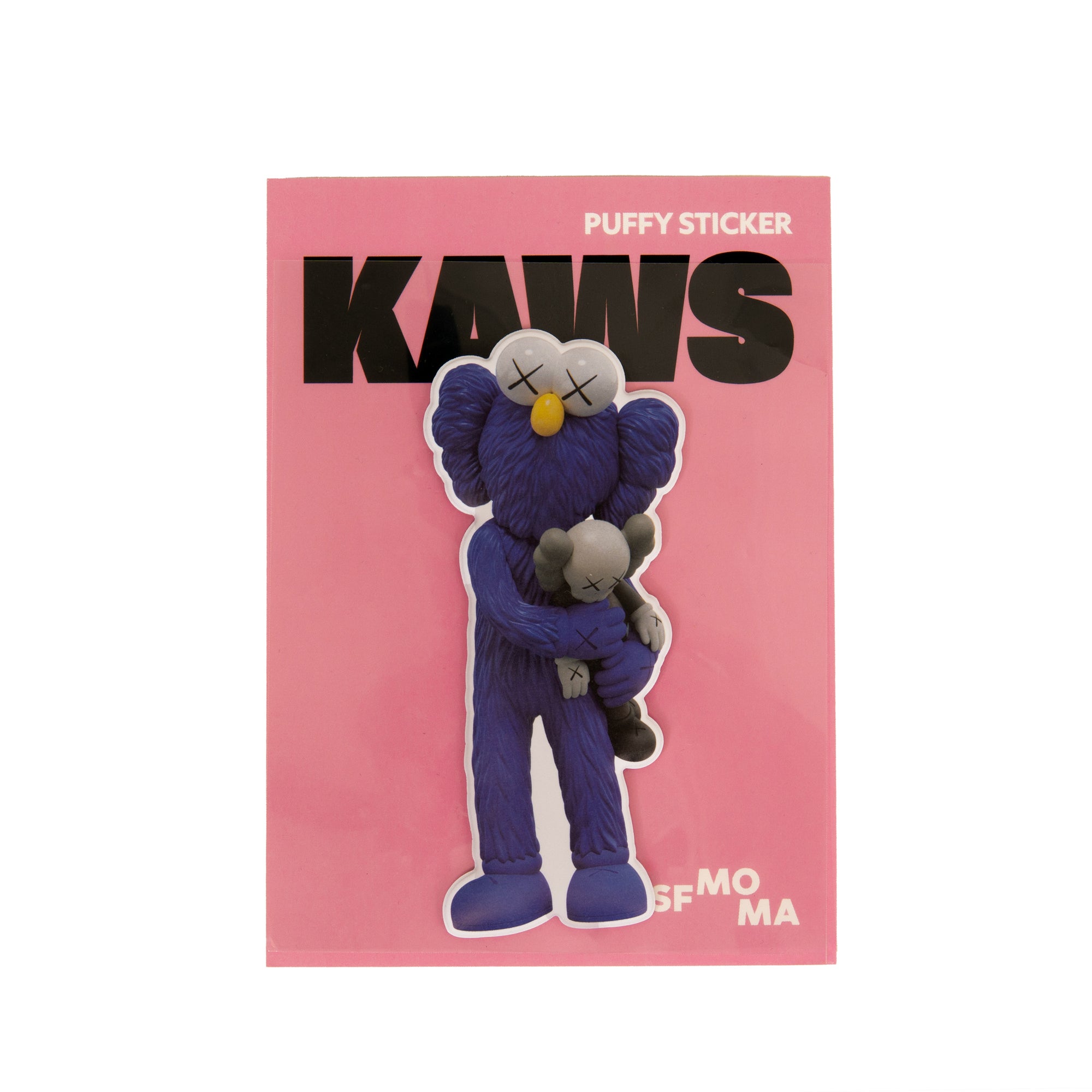 Kaws puffy sticker on a pink background with 'KAWS' branding.
