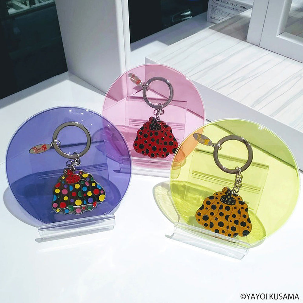 Yayoi Kusama Key Rings: Pumpkin Multi, Red and Yellow displayed in package