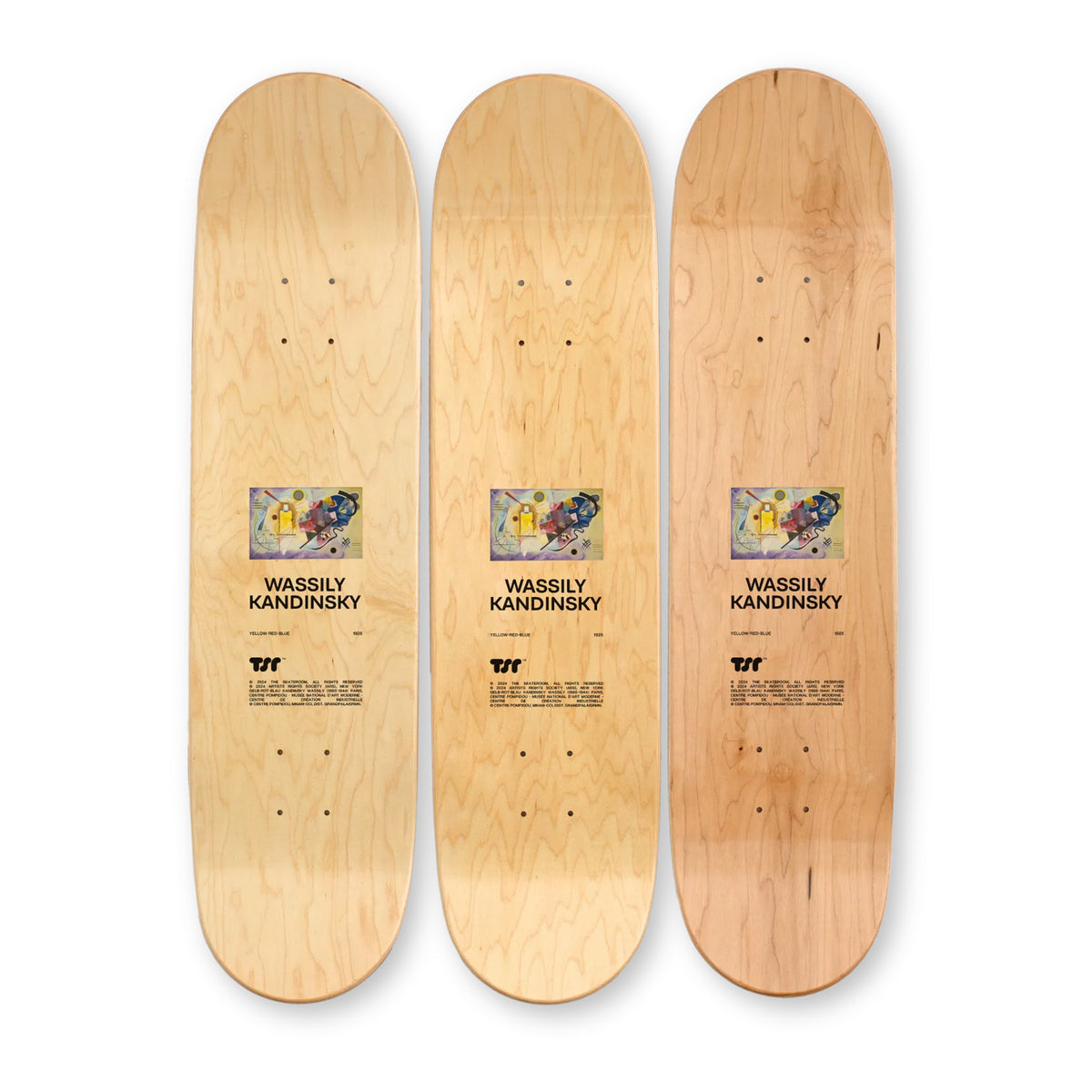 Three wooden skateboard decks with 'Wassily Kandinsky' design on a white background (back view)