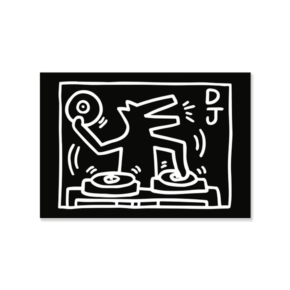 A black rectangular art magnet featuring a white line drawing of a DJ at turntables, with the letters 'DJ' in white on the right side, shown against a light gray background.