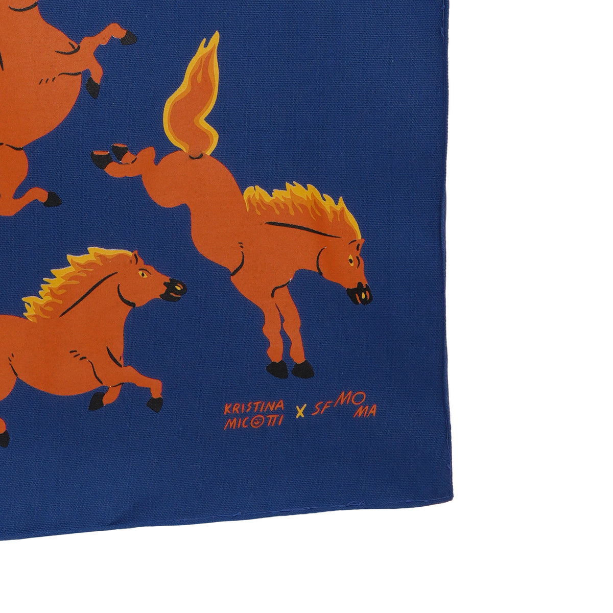 Blue fabric with orange horse illustrations and branding text.