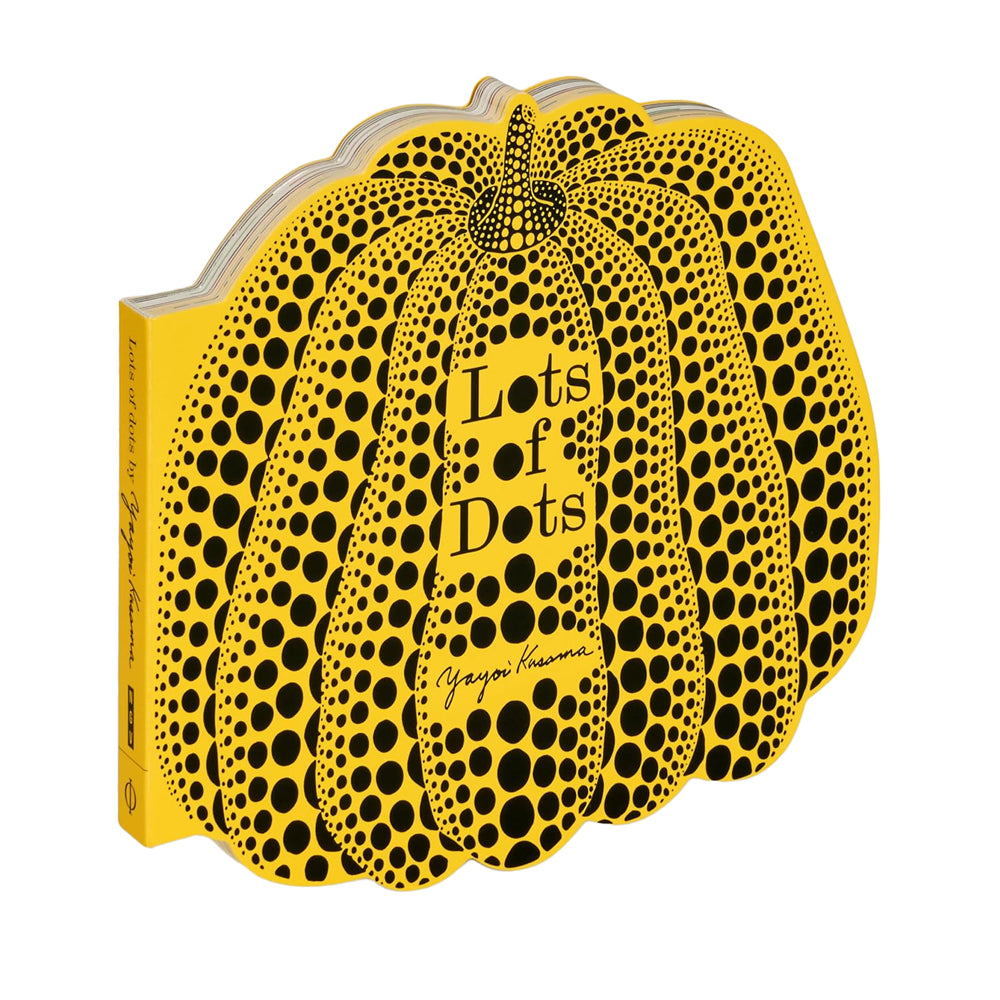 The book 'Lots of Dots' Yayoi Kusama, featuring a stylized yellow pumpkin design covered in black dots, shown on a plain white background.
