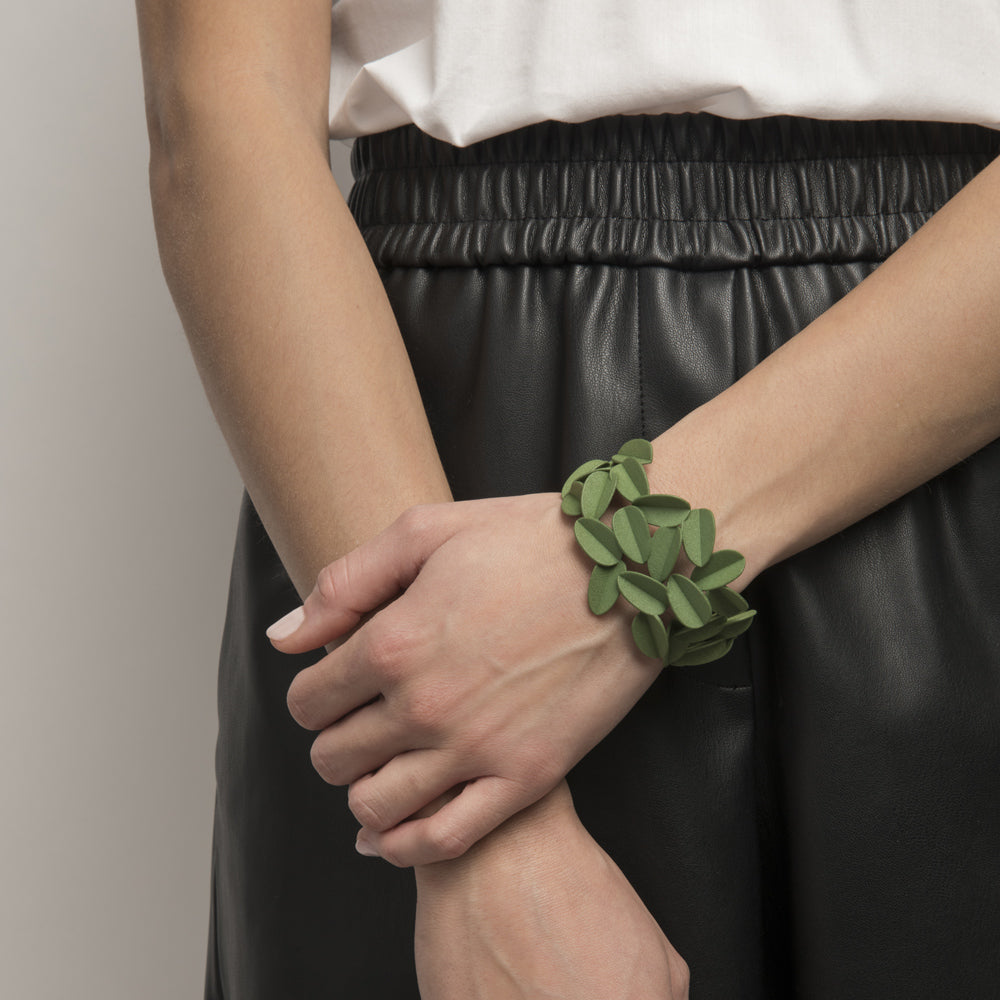 Model wearing bracelet.