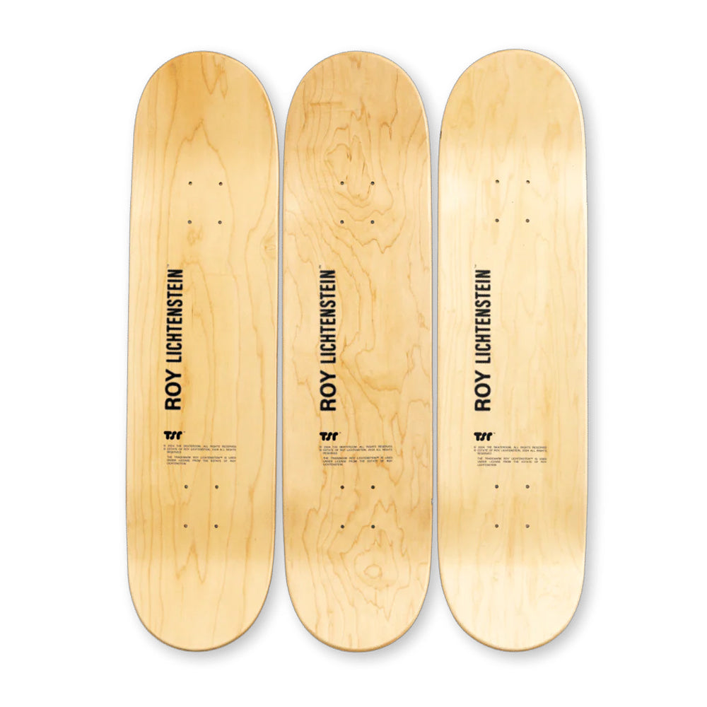 Three wooden skateboard decks with 'Roy Lichtenstein' branding on a white background