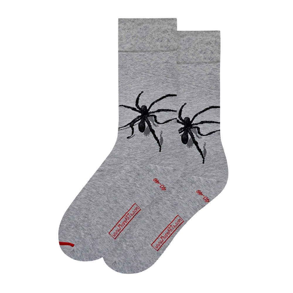 A pair of heather gray crew socks featuring a black spider graphic on the upper leg shown against a plain white background.