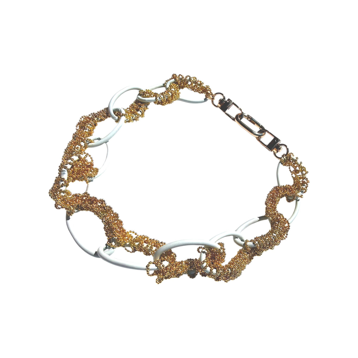 A multi-strand link bracelet featuring textured gold-toned mesh chains, polished silver-toned oval links, and a silver-toned lobster clasp, shown on a plain white background.