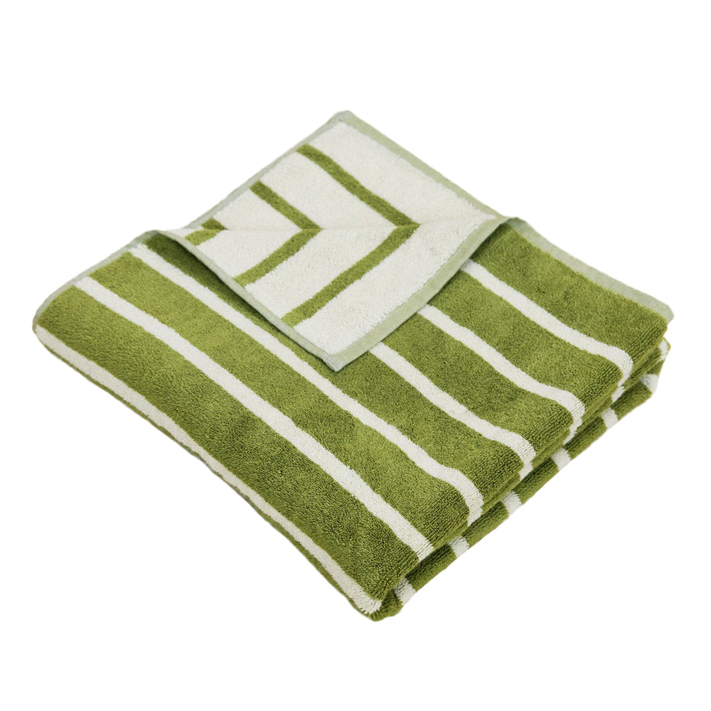 Folded green and white striped towel on a white background