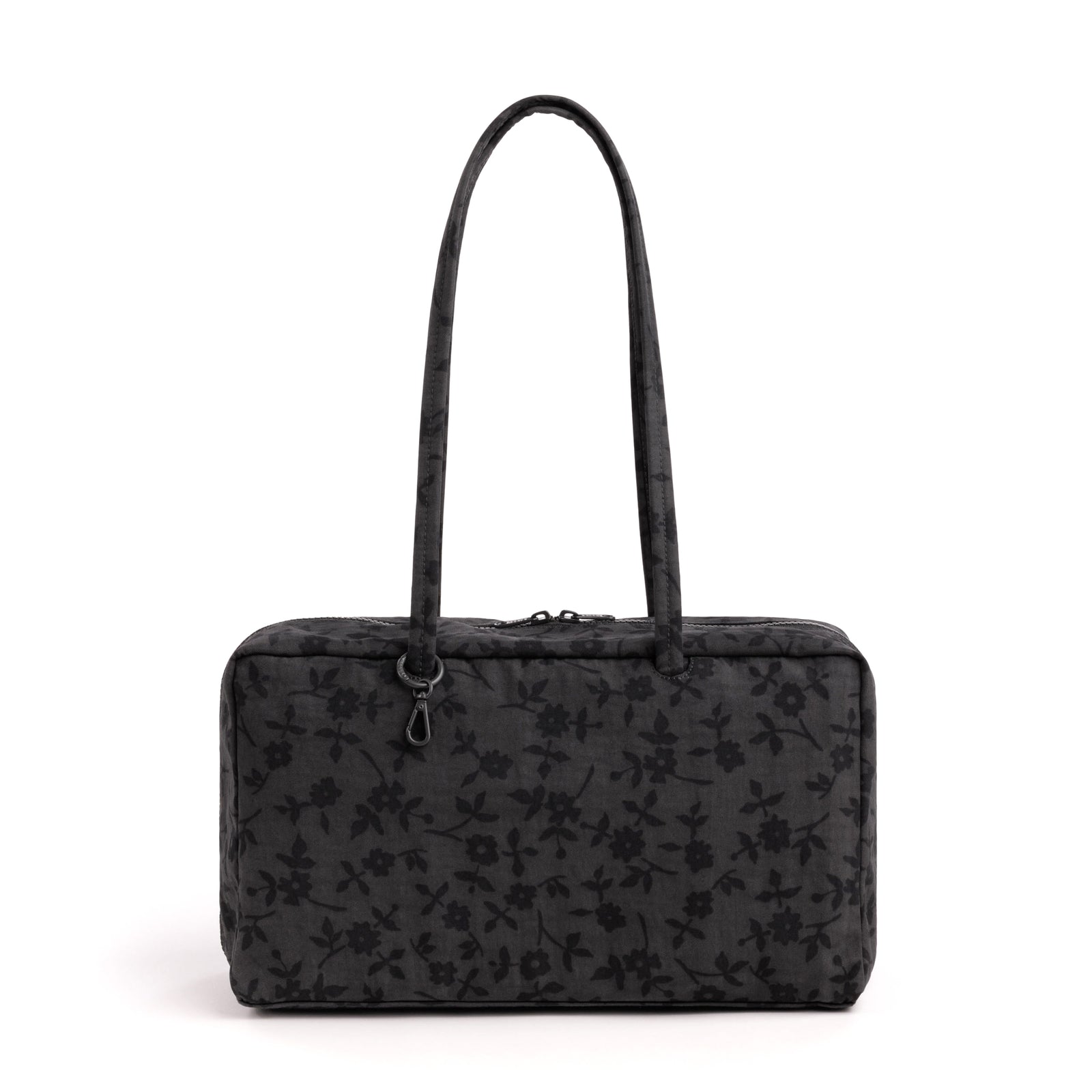 A black rectangular handbag with a subtle floral jacquard pattern and dual shoulder straps, shown against a plain white background.