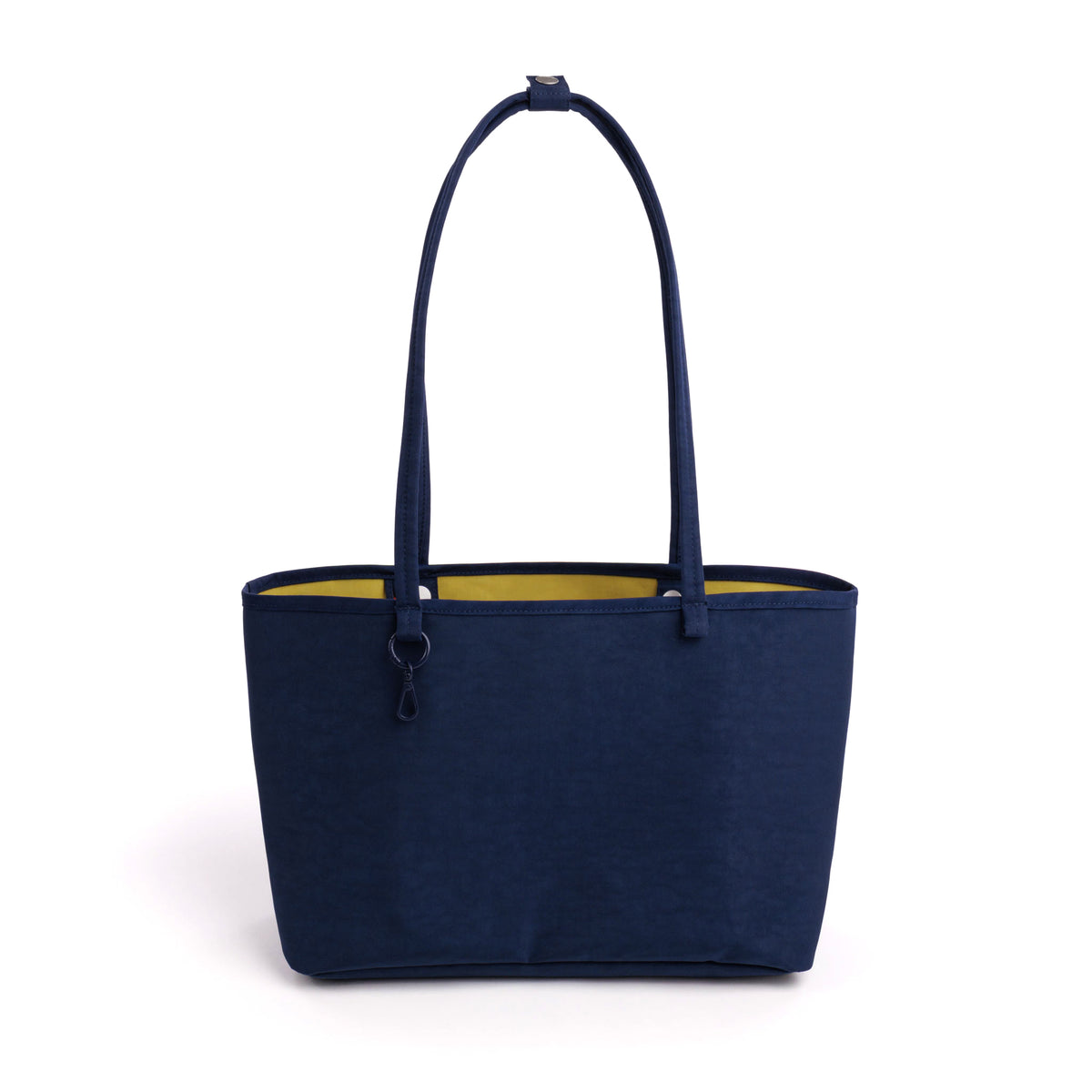 A navy blue nylon tote bag with long shoulder straps and a yellow interior lining, shown against a plain white background.