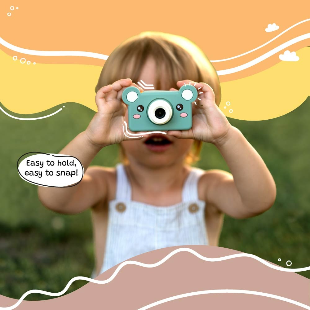 Child holding a toy camera with a colorful background