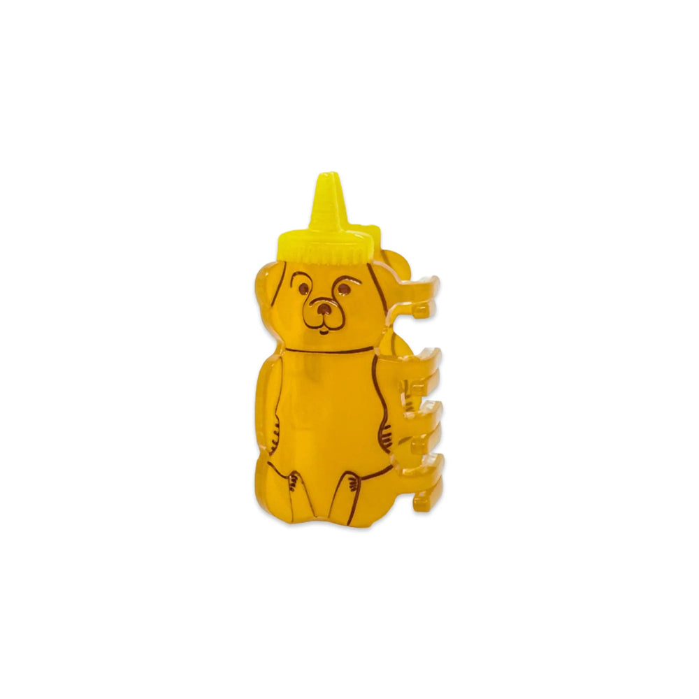 Honey bottle with a bear design on a white background
