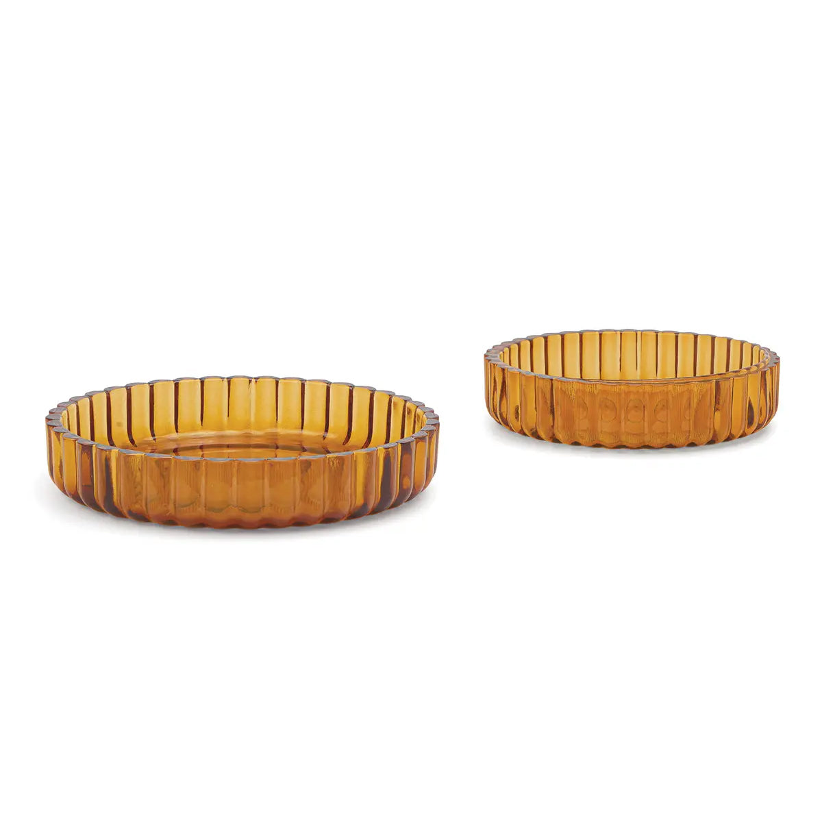 Two amber nesting bowls on a light gray background