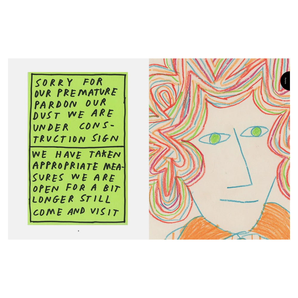 Colorful drawing of a face with text on a green sign