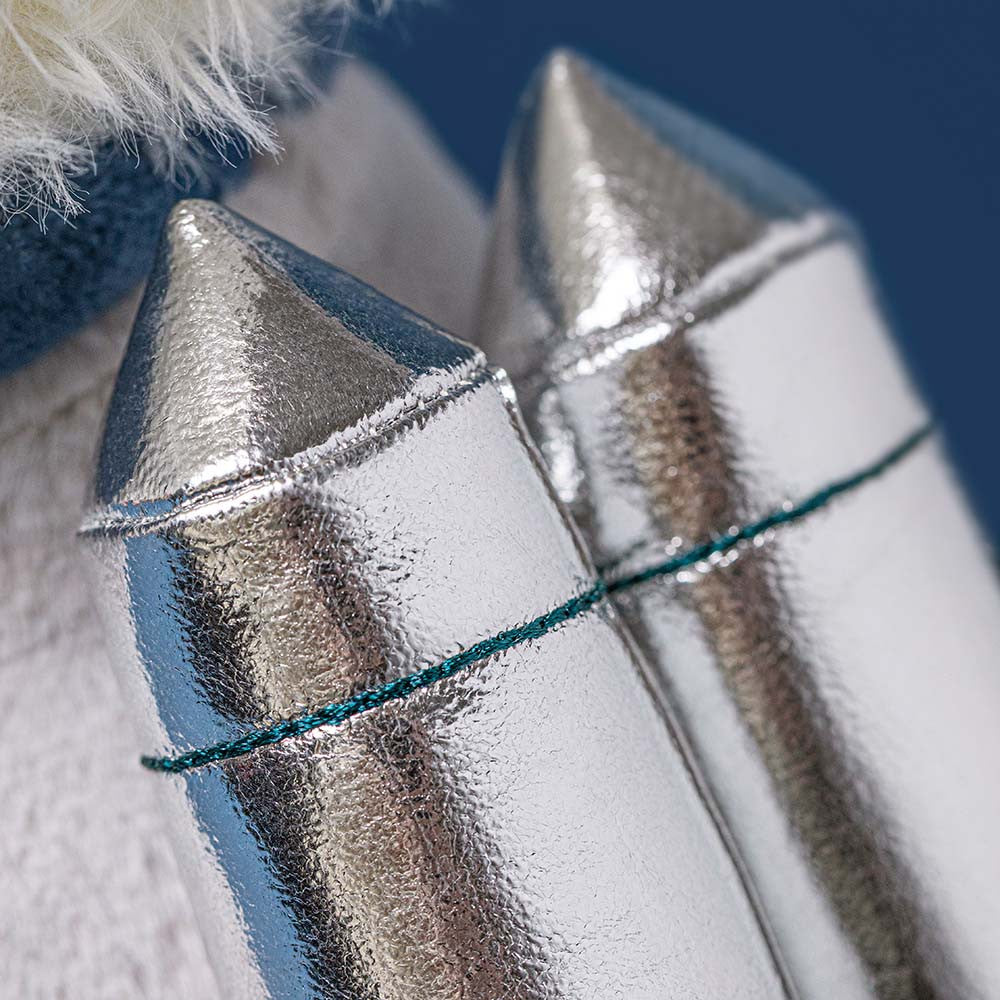 Close-up of metallic rocket with a blurred background