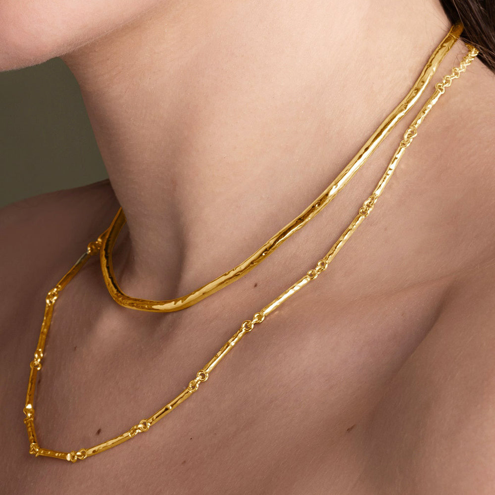 Close-up view of chain necklace.