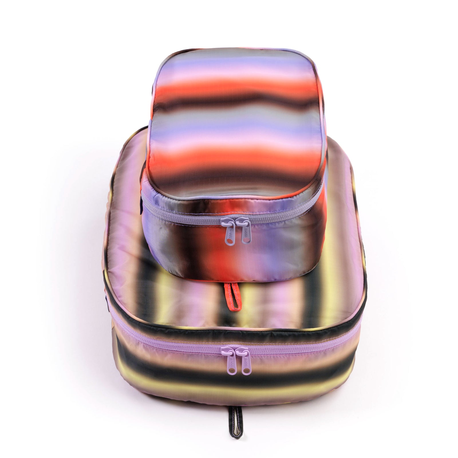 Multicolored striped pouches on a white background