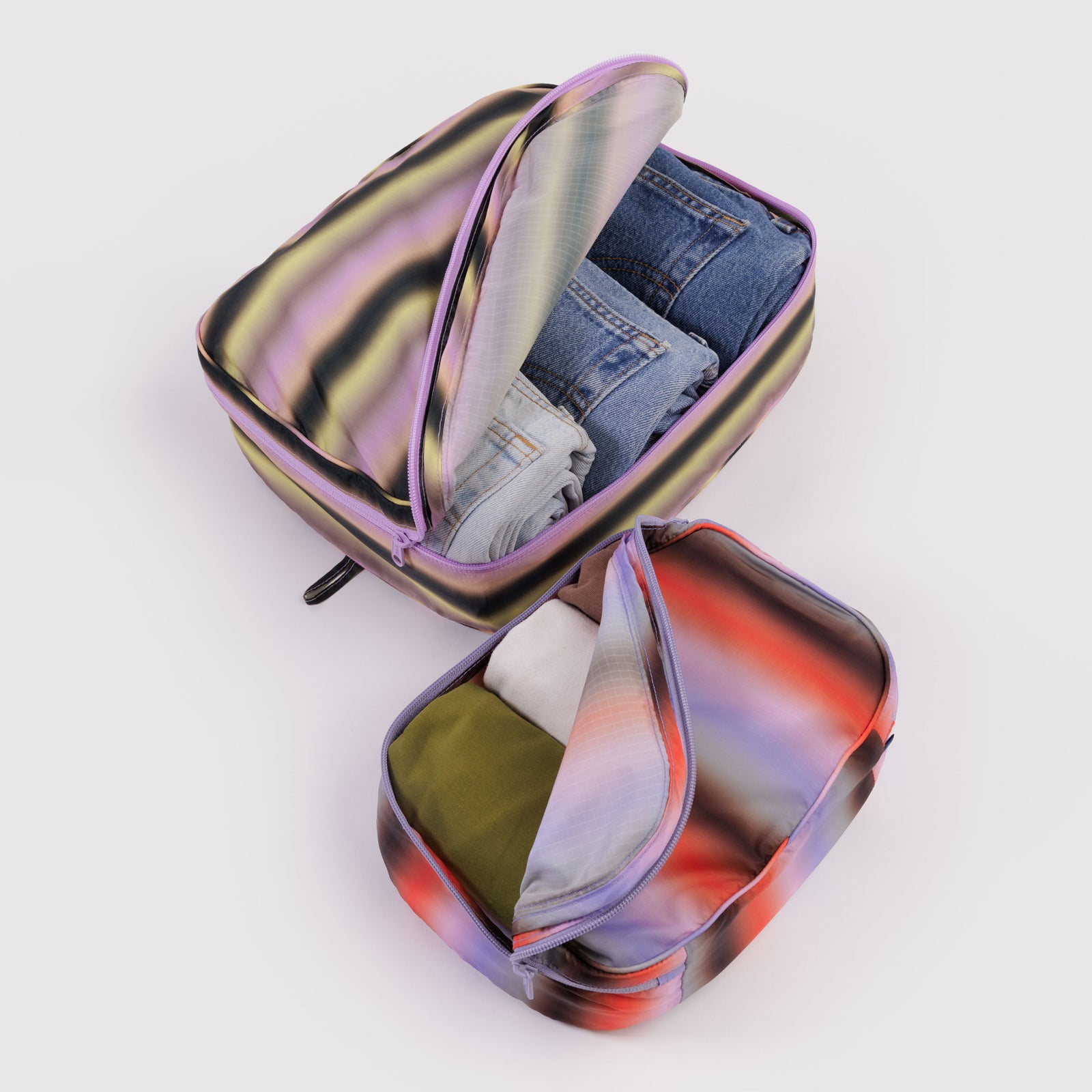Multicolored striped pouches on a white background